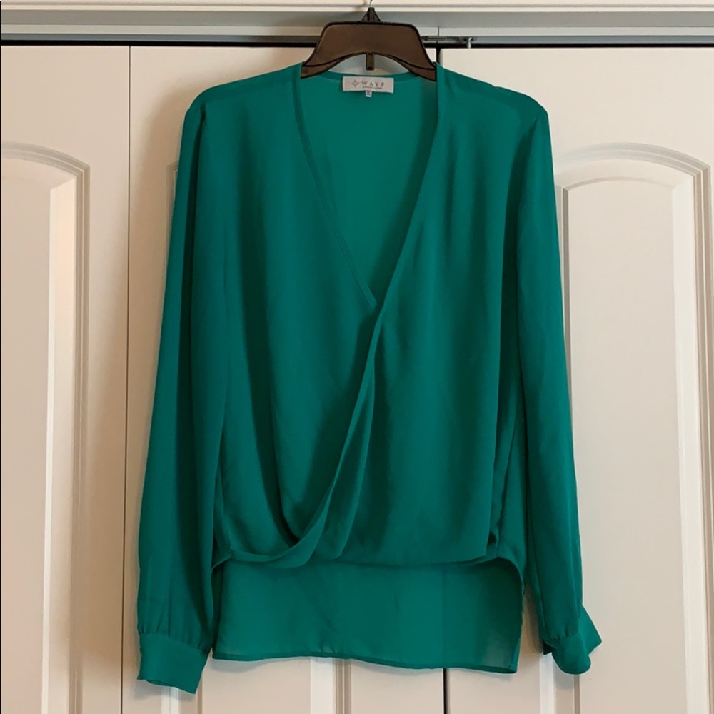 Greenish-turquoise long sleeve blouse.